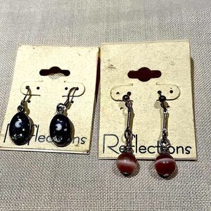 Two pairs Reflectiond earrings.
